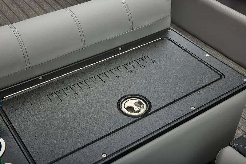 Slide: The Image of Manufacturer Provided Image: 2026 Ranger 220FC boat seat with integrated measuring ruler and cup holder. - 40