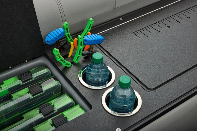 Slide: The Image of Manufacturer Provided Image: Interior of 2026 Ranger 220FC boat with tackle storage and cup holders. - 41