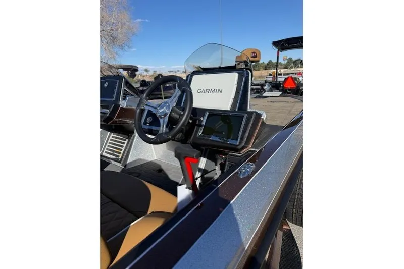 Slide: The Image of 2026 Ranger Z521R Cup-Equipped boat cockpit with Garmin navigation system. - 10