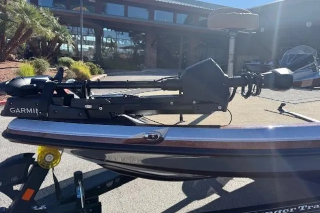 Slide: The Image of 2026 Ranger Z521R Cup-Equipped boat with Garmin equipment, parked outdoors. - 4