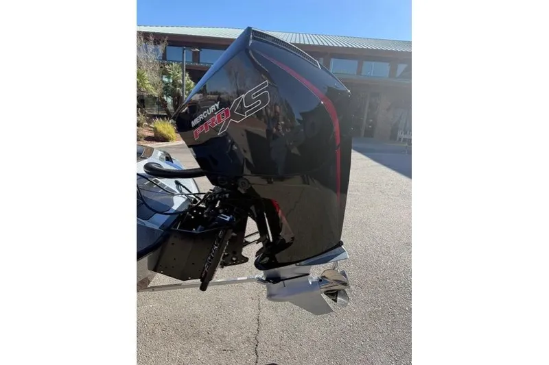 Slide: The Image of 2026 Ranger Z521R Cup-Equipped boat with Mercury Pro XS engine, outdoor setting. - 7