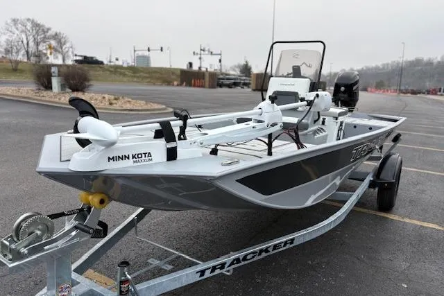 Slide: The Image of 2026 Tracker Bass Tracker Classic CC boat on trailer, featuring Minn Kota Maxxum motor. - 14