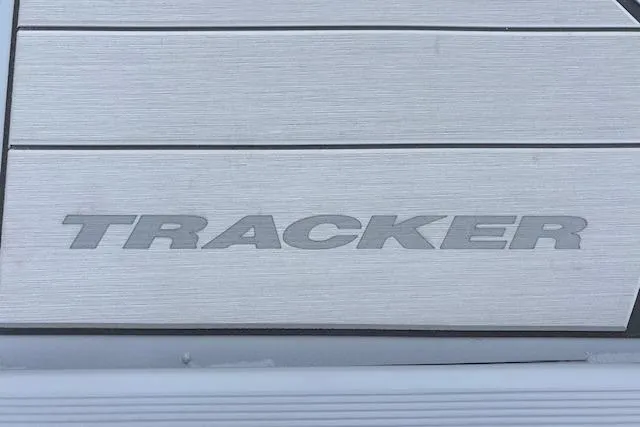 Slide: The Image of 2026 Tracker Bass Tracker Classic CC logo on sleek metallic surface. - 66