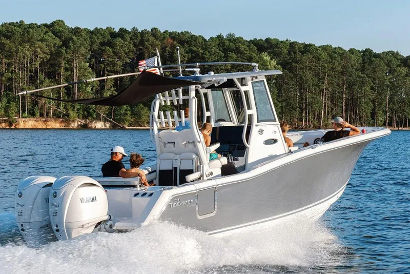 Slide: The Image of 2026 Tidewater 282 CC Adventure boat interior with seating and speakers. - 5