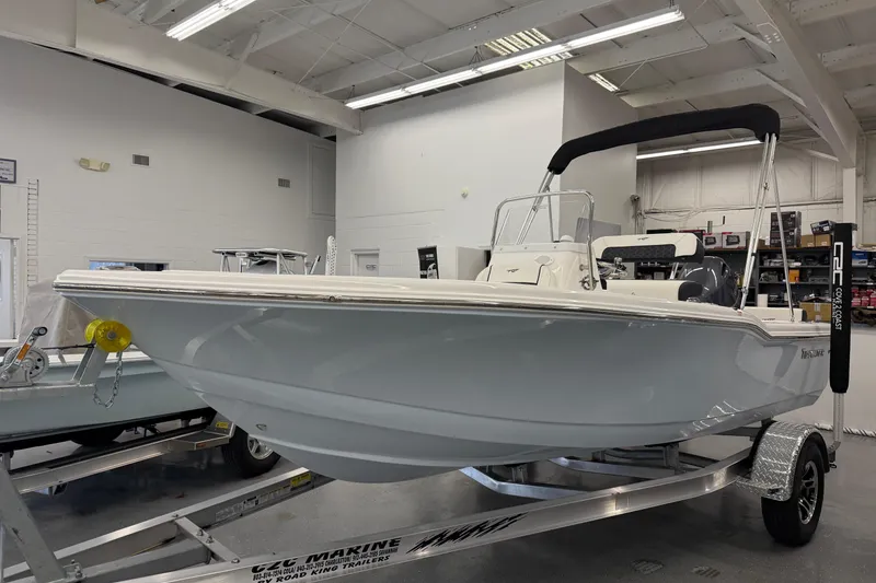 The Image of 2026 Tidewater 180 CC Adventure boat on trailer in showroom. - 1