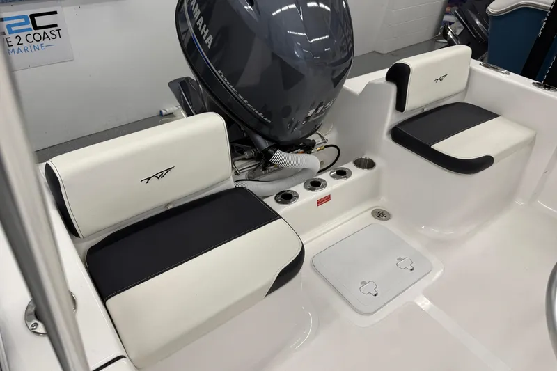 Slide: The Image of 2026 Tidewater 180 CC Adventure boat interior with Yamaha engine and seating. - 5
