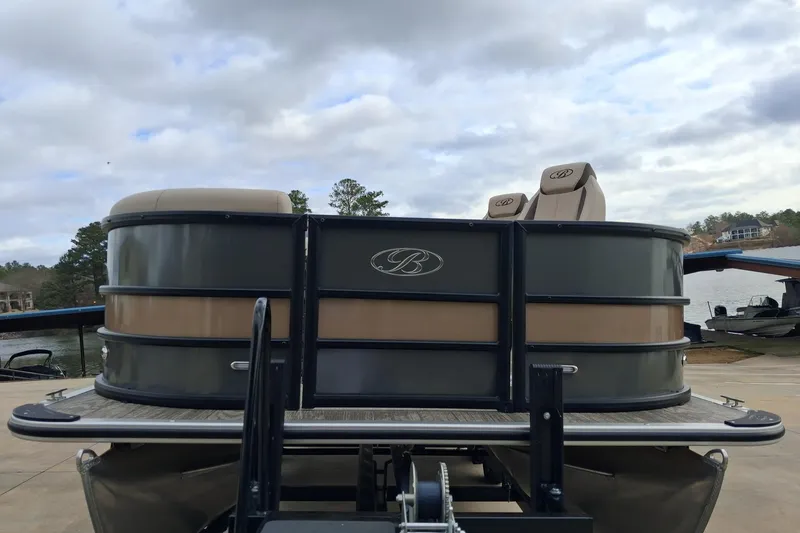 Slide: The Image of 2026 Bentley Pontoons Legacy 240 DL Navigator on a dock, showcasing luxury design. - 5