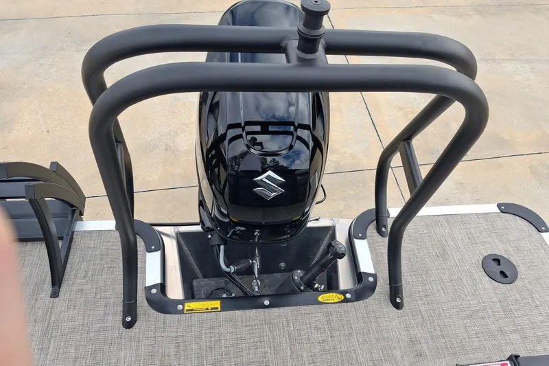 Slide: The Image of 2026 Bentley Pontoons Legacy 240 DL Navigator with Suzuki outboard motor, rear view. - 9