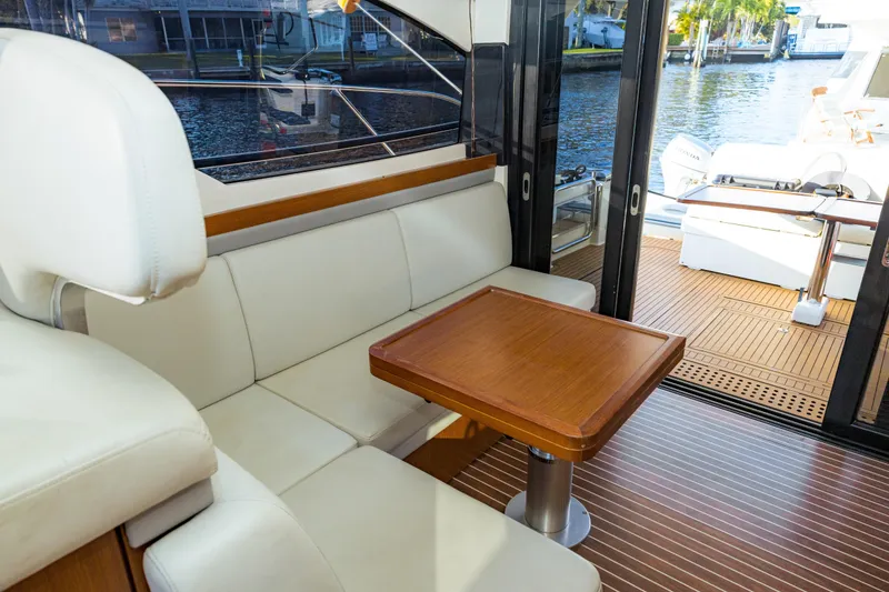 Slide: The Image of Luxurious interior of 2013 Bavaria Virtess 420 Fly yacht with elegant seating and wooden table. - 10