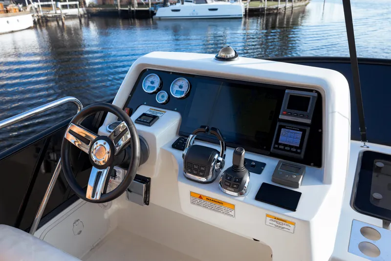 Slide: The Image of Cockpit of 2013 Bavaria Virtess 420 Fly yacht with modern navigation controls. - 16