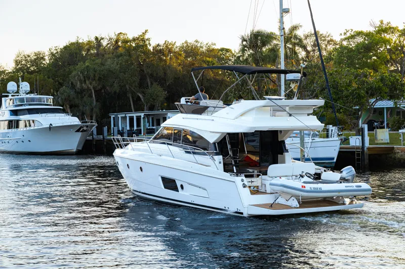 Slide: The Image of 2013 Bavaria Virtess 420 Fly yacht cruising on a scenic waterway. - 3