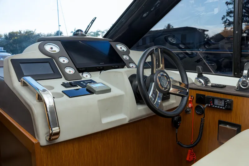 Slide: The Image of Cockpit of 2013 Bavaria Virtess 420 Fly yacht with modern navigation controls. - 7