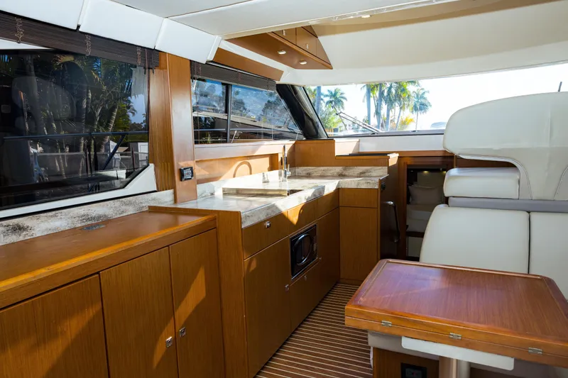 Slide: The Image of Luxurious interior of 2013 Bavaria Virtess 420 Fly yacht with modern kitchen and seating. - 8