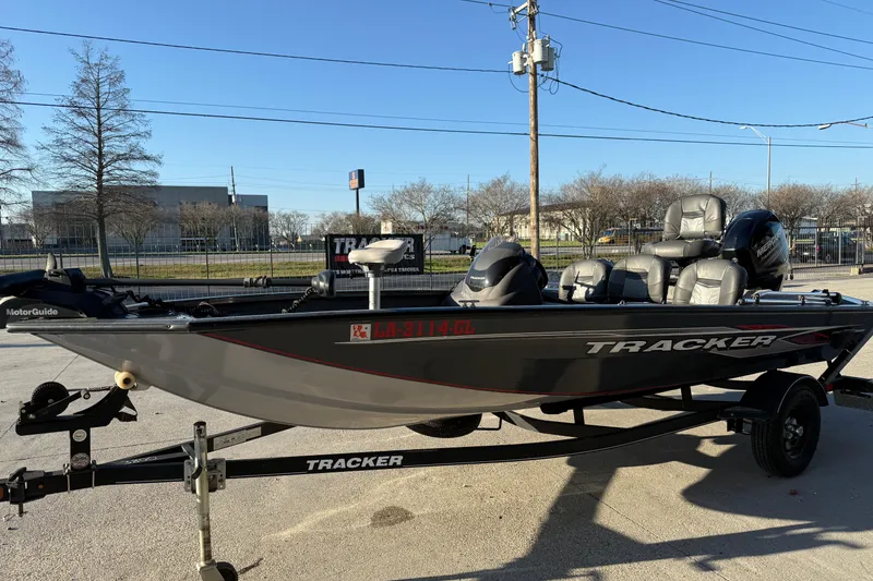 Slide: The Image of 2020 Tracker Pro Team 175 TF fishing boat on trailer, parked outdoors. - 6