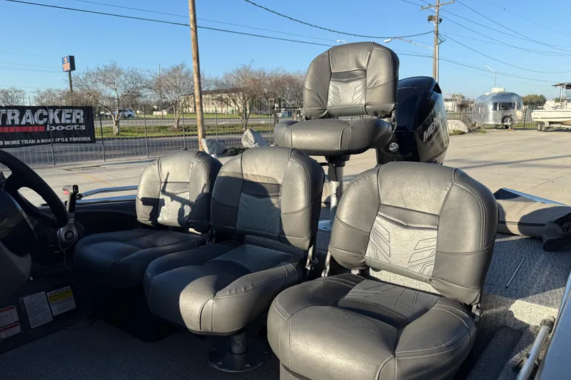 Slide: The Image of 2020 Tracker Pro Team 175 TF boat interior with four cushioned seats. - 8