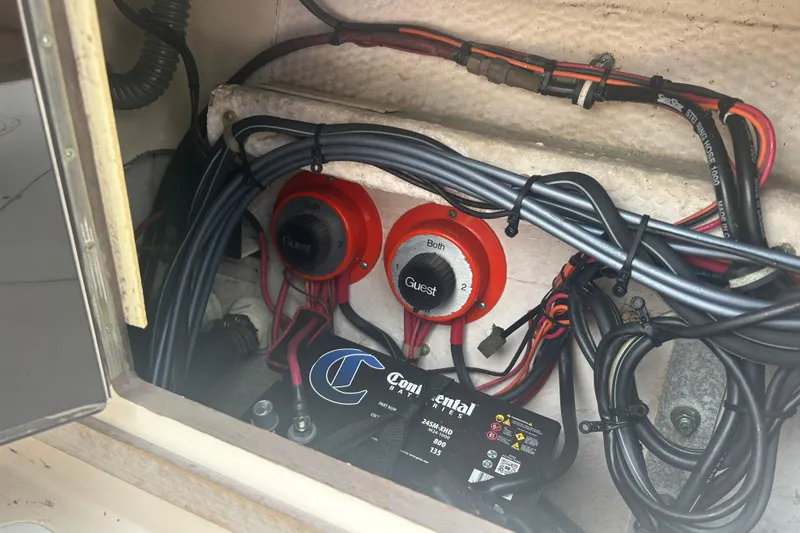 Slide: The Image of Electrical wiring and battery setup in a 1992 Grady-White Sailfish 252 boat. - 16