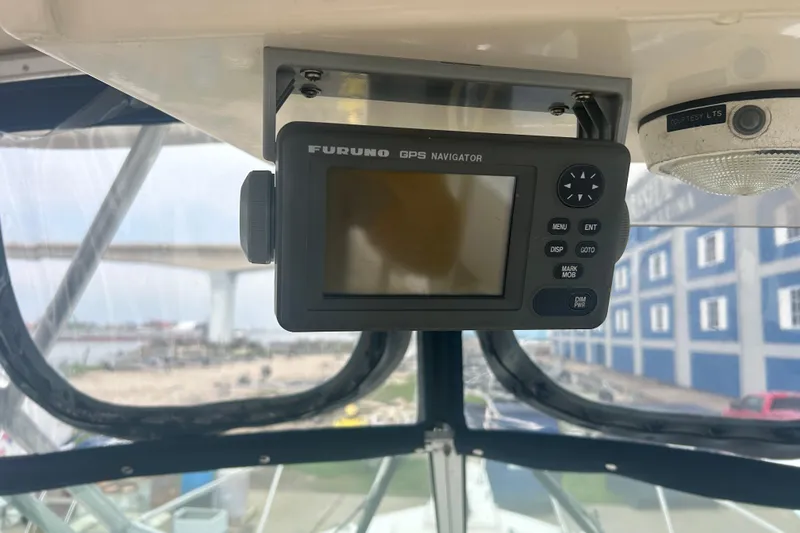 Slide: The Image of Furuno GPS navigator on 1992 Grady-White Sailfish 252 boat, with marina view. - 28