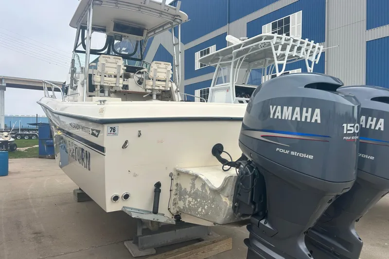 Slide: The Image of 1992 Grady-White Sailfish 252 boat with twin Yamaha 150 four-stroke engines. - 5