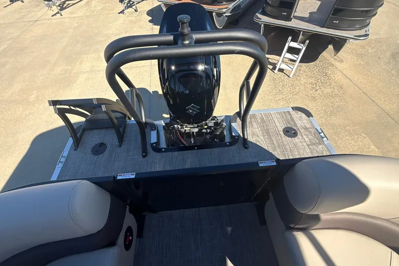 Slide: The Image of 2026 Bentley Pontoons Legacy 243 Navigator with sleek deck and powerful engine. - 9