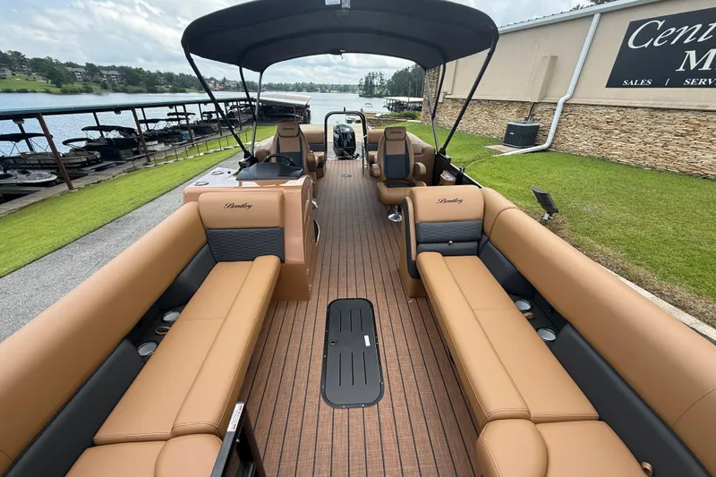 Slide: The Image of 2026 Bentley Pontoons Elite 253 Admiral with luxurious seating and sleek design. - 2
