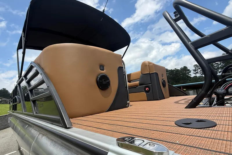 Slide: The Image of 2026 Bentley Pontoons Elite 253 Admiral, luxury deck view with seating and canopy. - 9