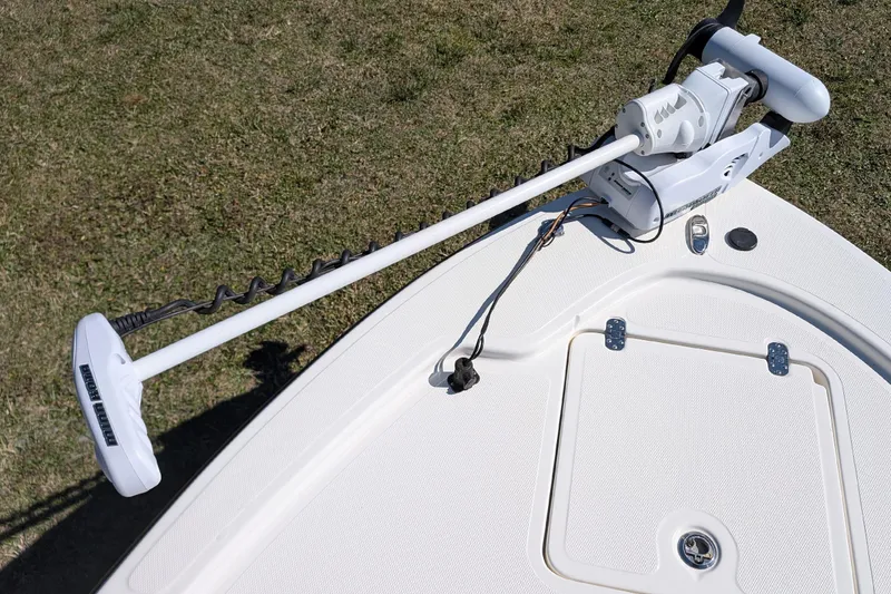 Slide: The Image of 2015 Mako 18 LTS boat with trolling motor on grassy background. - 13