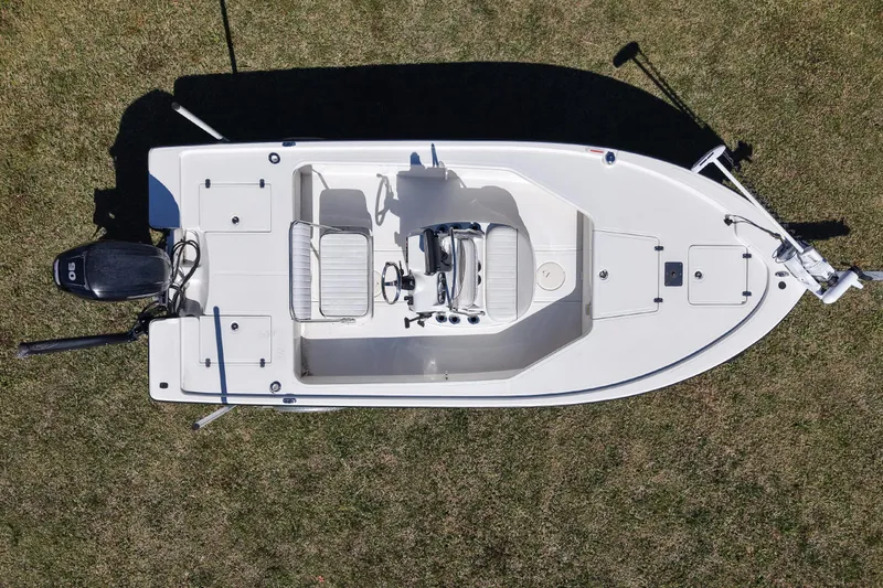 Slide: The Image of Top view of a 2015 Mako 18 LTS boat on grass. - 9