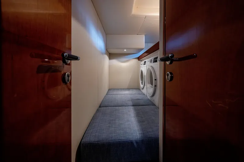 Slide: The Image of Laundry room with washer and dryer on 1997 Ferretti Yachts 650. - 27