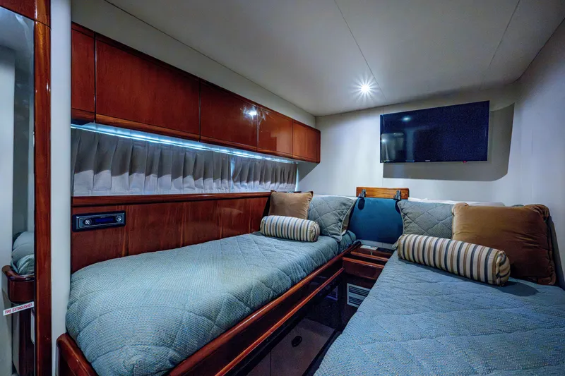 Slide: The Image of Luxurious cabin interior of 1997 Ferretti Yachts 650 with twin beds and modern amenities. - 38