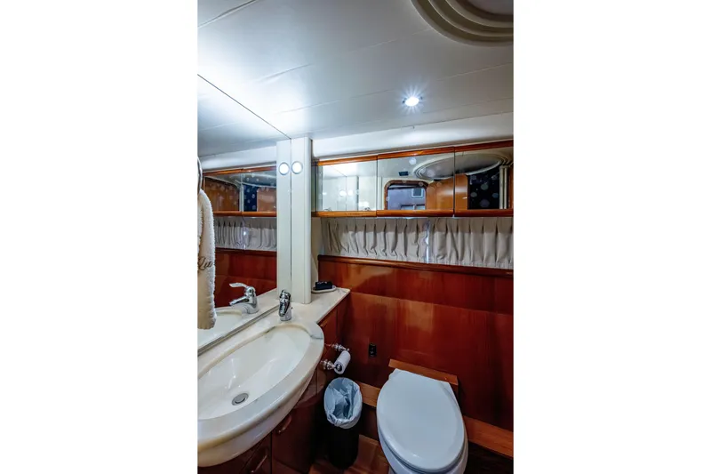 Slide: The Image of Luxurious bathroom interior of 1997 Ferretti Yachts 650 with elegant wood finish. - 40