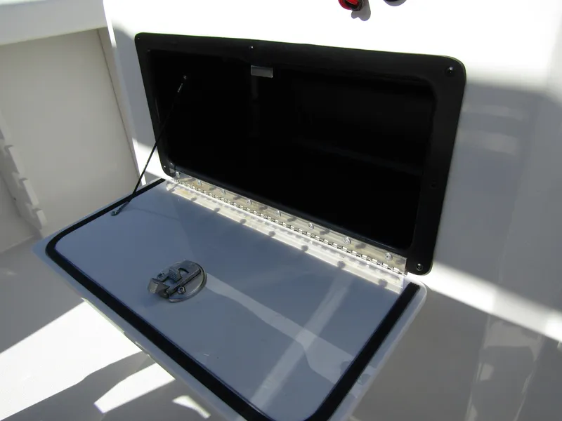 Slide: The Image of Open storage compartment on 2024 Starcraft SVX 191 OB CC boat. - 29