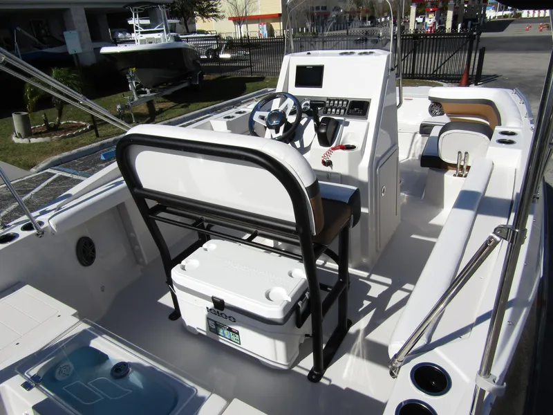 Slide: The Image of 2024 Starcraft SVX 191 OB CC boat interior with console and seating. - 40