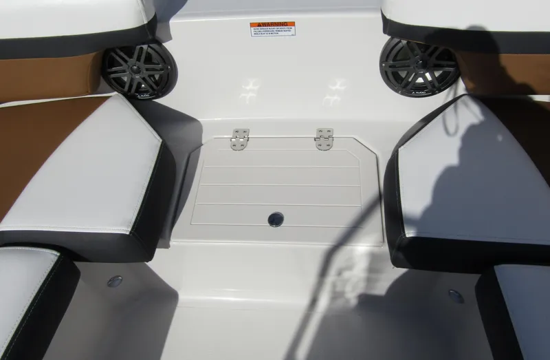 Slide: The Image of 2024 Starcraft SVX 191 OB CC boat interior seating and storage. - 12