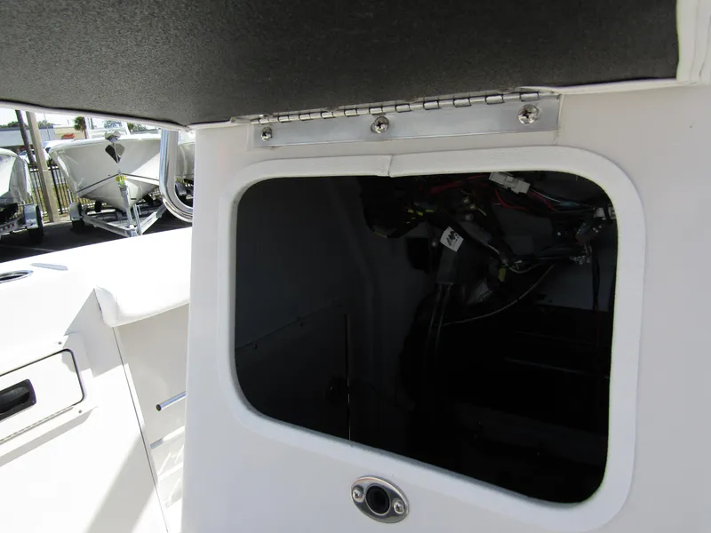 Slide: The Image of 2024 Starcraft SVX 191 OB CC storage compartment with wiring - 16