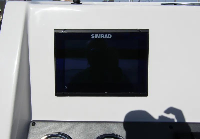 Slide: The Image of Simrad display on 2024 Starcraft SVX 191 OB CC boat dashboard. - 24