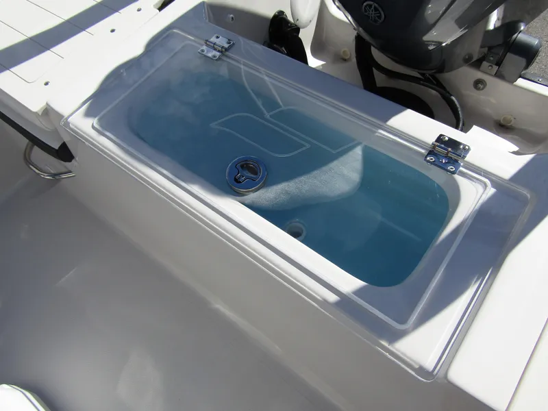 Slide: The Image of 2024 Starcraft SVX 191 OB CC livewell compartment. - 32