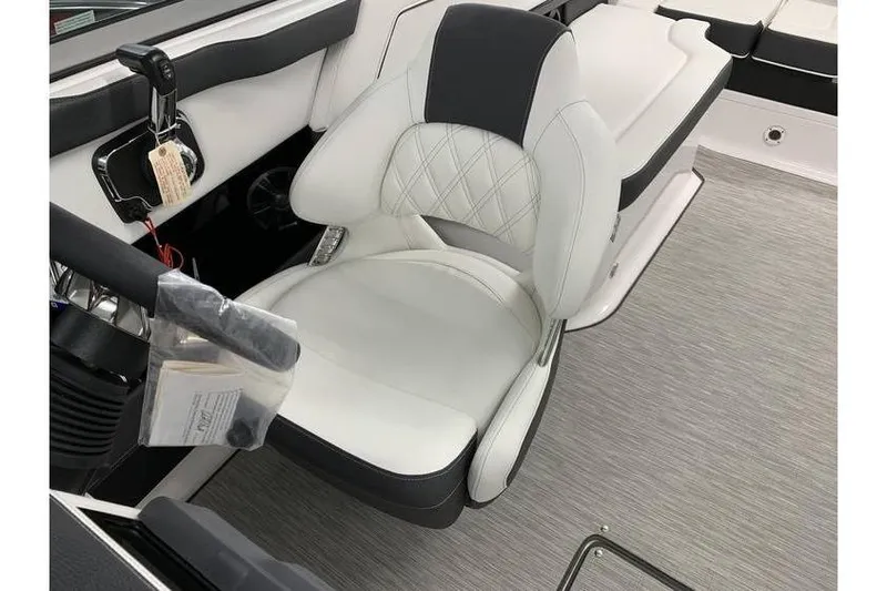 Slide: The Image of 2019 Regal 2500 Bowrider interior with white and black seating, modern design. - 10