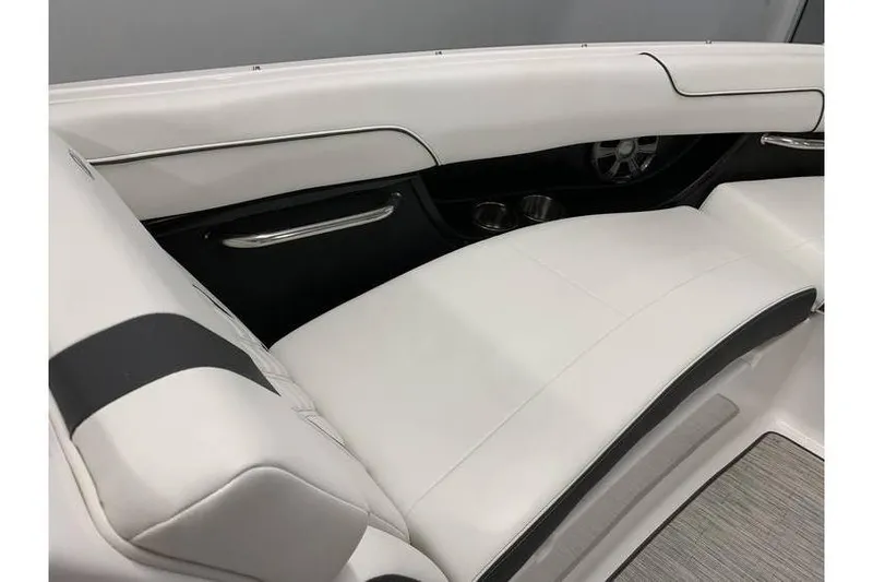 Slide: The Image of 2019 Regal 2500 Bowrider interior with white leather seating and sleek design. - 16