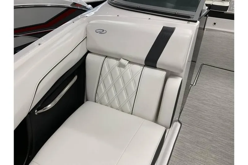 Slide: The Image of 2019 Regal 2500 Bowrider interior with white leather seating and elegant design. - 19