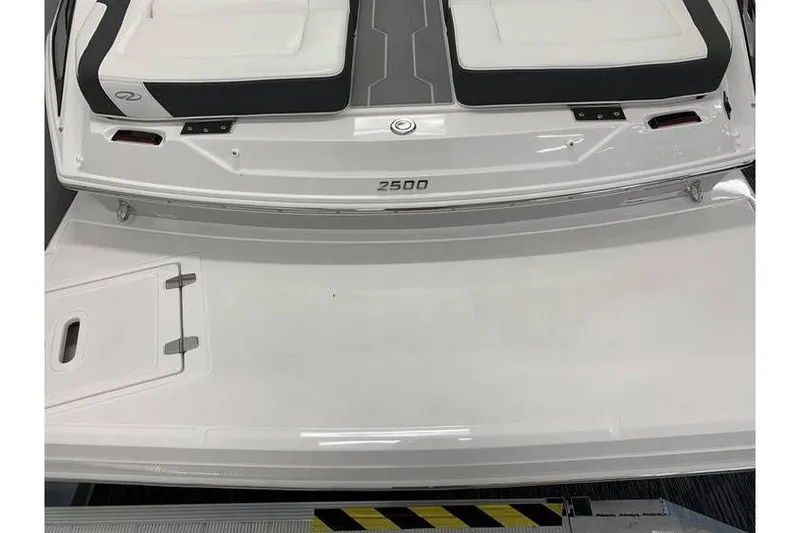 Slide: The Image of 2019 Regal 2500 Bowrider boat, rear view with swim platform and seating. - 4