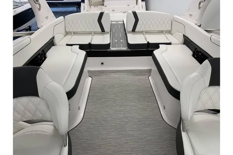Slide: The Image of 2019 Regal 2500 Bowrider interior with luxurious white and black seating. - 8