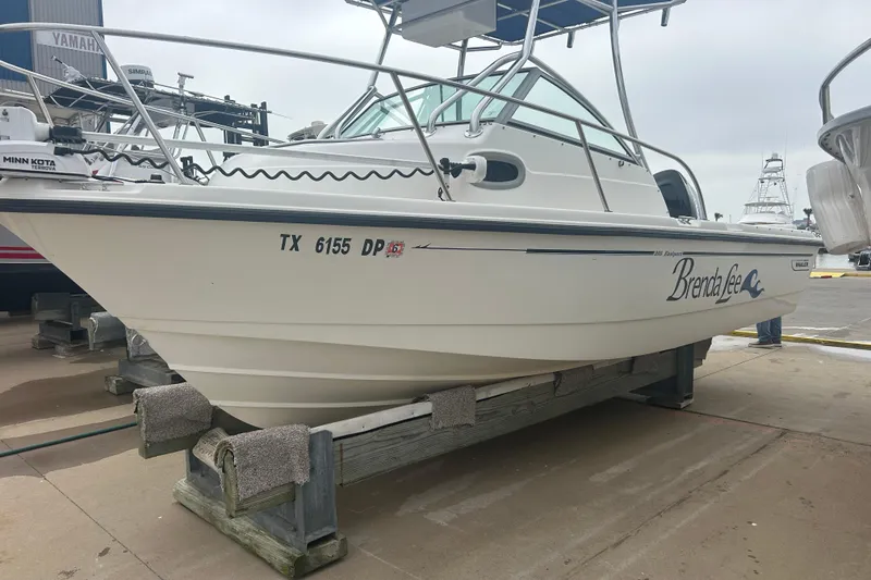 The Image of 2005 Boston Whaler 205 Eastport boat on dock, named "Brenda Lee," with registration TX 6155 DP. - 0