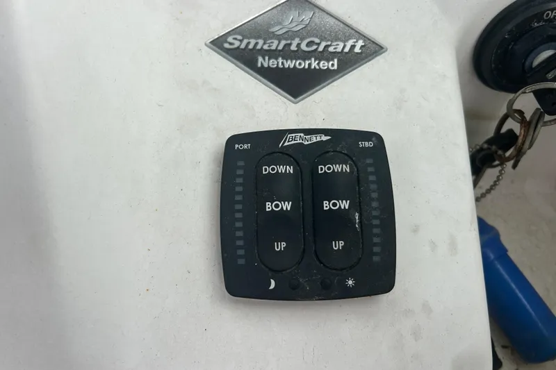Slide: The Image of Control panel of a 2005 Boston Whaler 205 Eastport boat with SmartCraft and Bennett trim tabs. - 24
