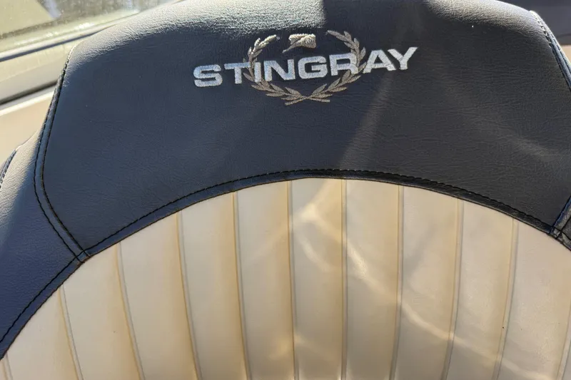 Slide: The Image of 2018 Stingray 204 LR boat seat with embroidered logo and laurel design. - 20