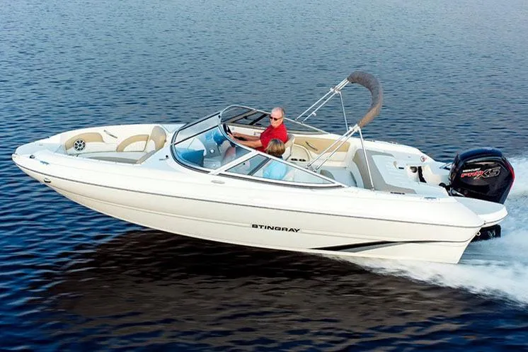 Slide: The Image of Manufacturer Provided Image: 2018 Stingray 204 LR boat cruising on water. - 30