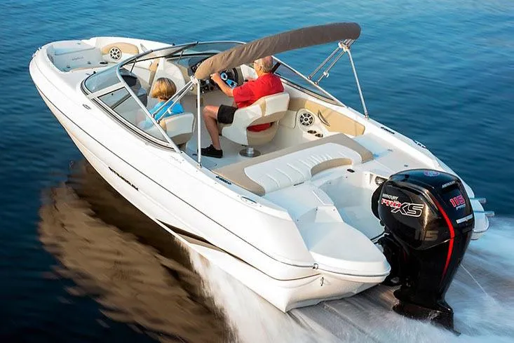 Slide: The Image of Manufacturer Provided Image: 2018 Stingray 204 LR boat cruising on water. - 31