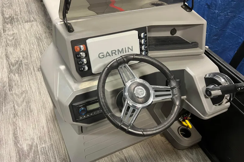 Slide: The Image of 2024 Angler Qwest 8522 LTZ Fish N Ski boat dashboard with Garmin navigation system. - 11