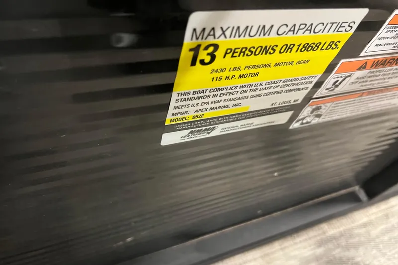 Slide: The Image of 2024 Angler Qwest 8522 LTZ Fish N Ski capacity label, 13 persons or 1868 lbs. - 12