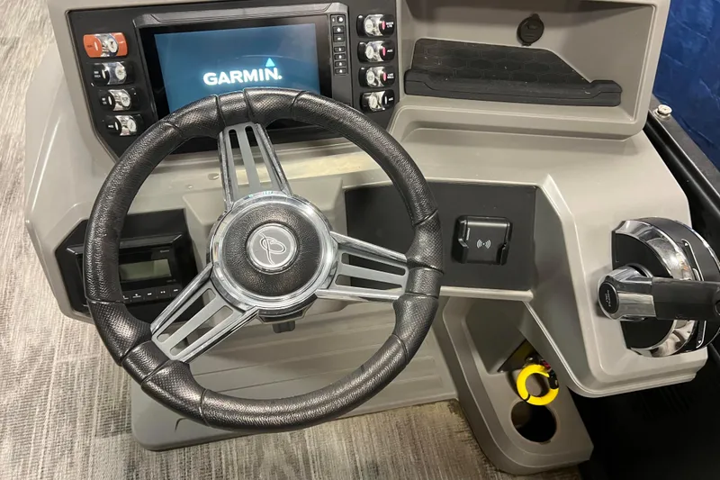 Slide: The Image of 2024 Angler Qwest 8522 LTZ Fish N Ski dashboard with Garmin navigation system. - 25