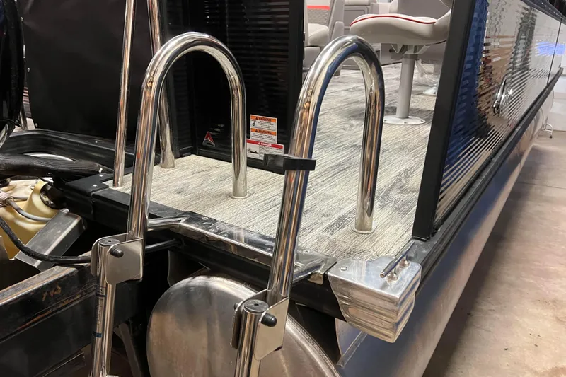 Slide: The Image of 2024 Angler Qwest 8522 LTZ Fish N Ski boat with stainless steel ladder and seating. - 32